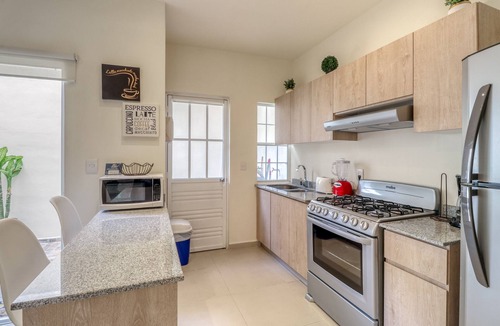 Puerto Juarez Villa | Modern villa in a quiet location with strong WiFi, AC, pool & garden