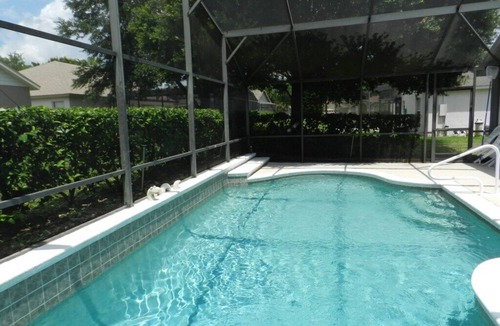 Orange Tree House | This charming country pool home is so cozy and homey! Perfect location for maximum fun! (MAG16153)