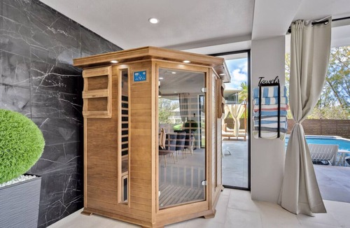 Rock Harbor Villa | Waterfront Luxe Pool, Hot Tub, Theater, Games and More!