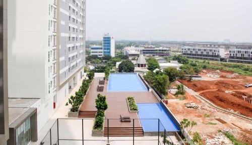 1BR Spacious Combine Unit at Vasanta Innopark Apartment By Travelio in Cikarang