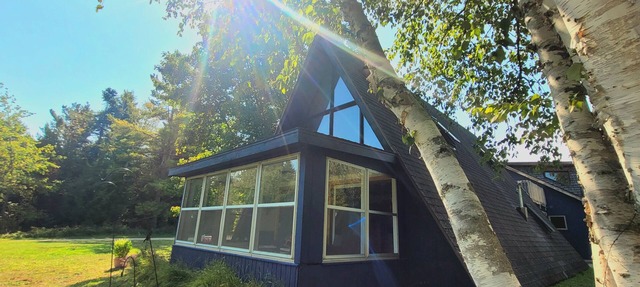 A Frame cabin with a short stroll to a gorgeous sandy beach! in Beaver Island