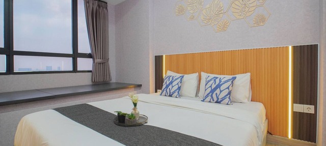 Chic And Homey Studio Room At Apartment Collins Boulevard in Tangerang