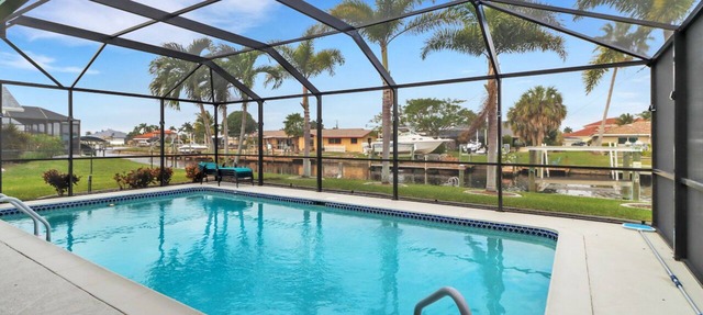 Coastal Paradise 1013 Modern European Style Waterfront Home w/Gourmet Kitchen & heated Pool in Cape Coral