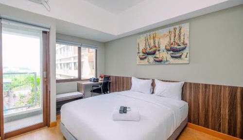 Comfortable Pool View Studio Room at Gateway Park LRT City Jatibening Apartment By Travelio in Bekasi