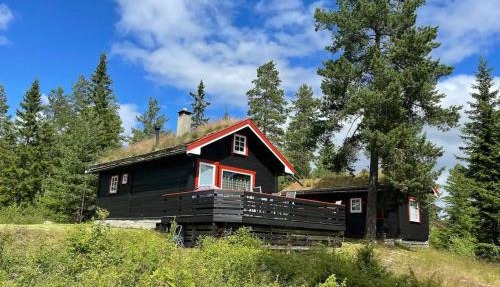 Enjoy Traditional, Norwegian Cabin Coziness in Traut