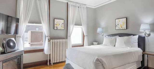 Experience a refined retreat at this elegant apartment situated in the vibrant center of downtown Two Harbors, Minnesota. in Two Harbors