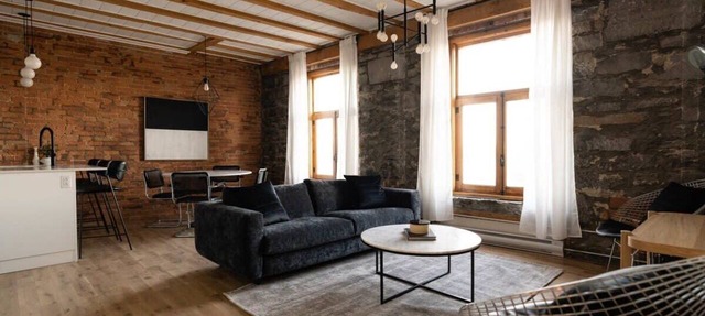 Maison Place Royale Luxury Waterfront One-Bedroom Apartment Old Montreal Water View St. Lawrence River Full Kitchen Stone Walls Wi-Fi AC in Montréal