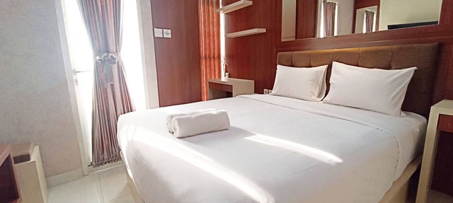 Modern Look And Homey Studio Amartha View Apartment in Semarang