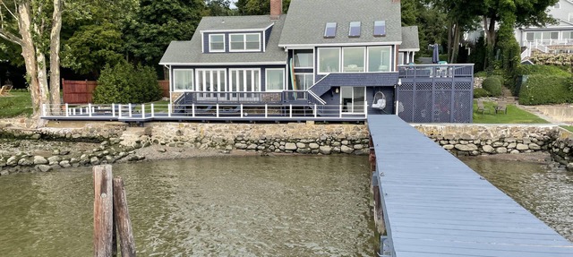 River front with large decks and dock over the Hudson in Nyack