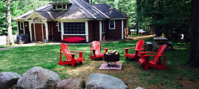 Short walk to village.with private wooded setting. EV Charger in parking area. in Lake Placid