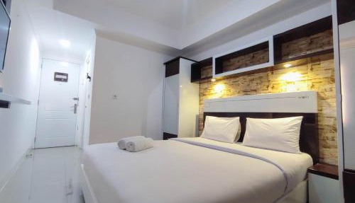 Simple and Homey Studio Room at Paltrow City Apartment By Travelio in Semarang