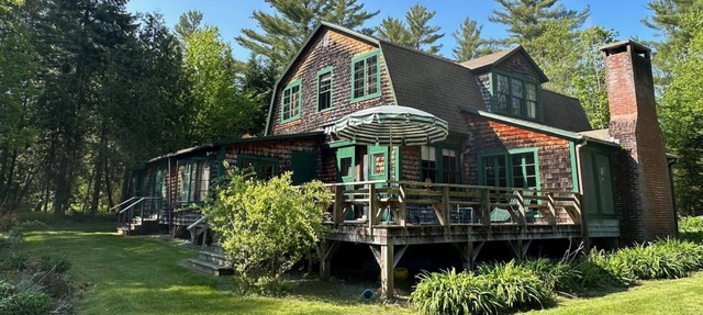Spacious, rustic getaway on Caspian Lake with two docks & lawn. in Greensboro