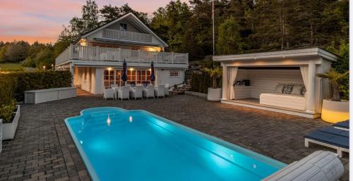Spacious villa with heated pool and stunning view in Frder