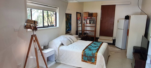 Studio style self contained room, steps to the beach. in Callala Bay