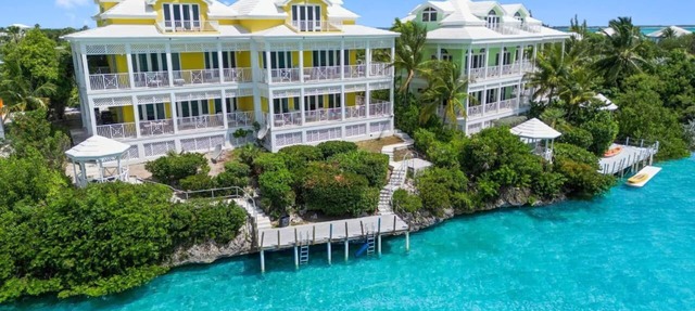 Waterfront Villa with Dock, Walk to Beach Club & Rusty Anchor Rest. 3b/r 3.5b/a in Georgetown